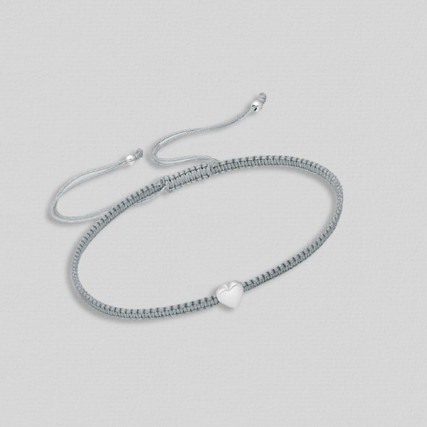 Zapestnica s srebrnim polnim srčkom 